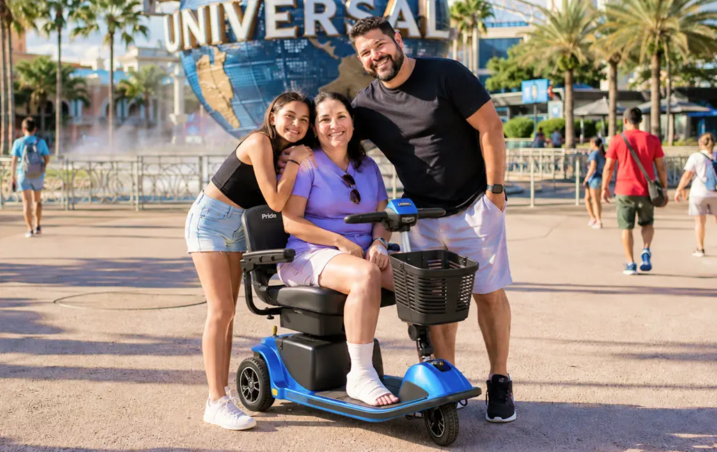 Mother and Son on Mobility Scooter at Universal Studios